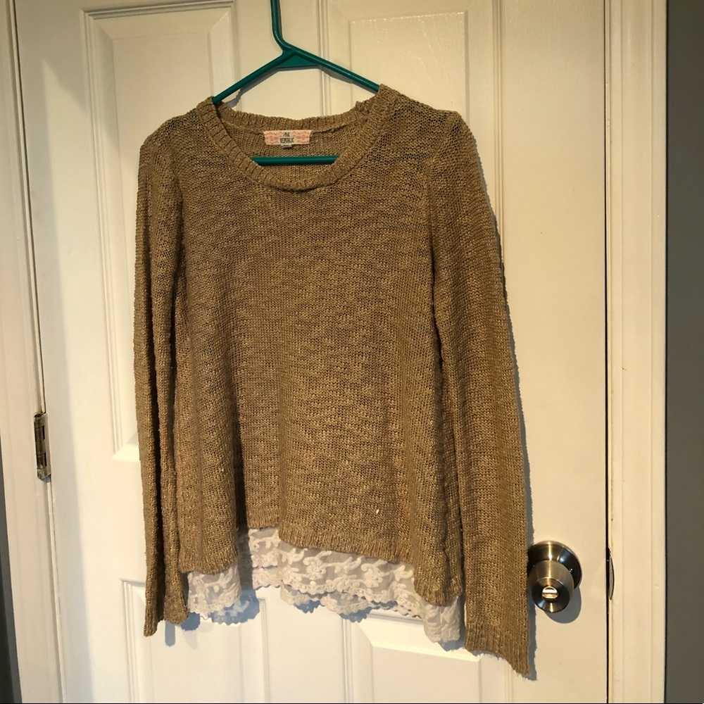Beige knitted sweater with lace bottom